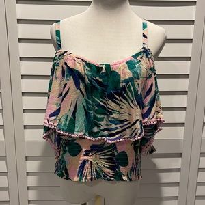 Torrid open Shoulder with adjustable Straps Top in a colorful print.